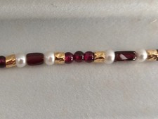 Bracciale argento dorato con