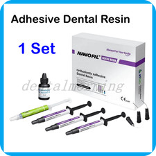 Resina dentale adesiva