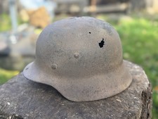 WW2 Elmetto tedesco originale M35 usato come pala, dalla battaglia di Kurland,