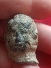 Antica testa romana in bronzo