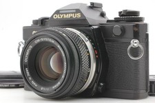 【Ecc+5】 Olympus OM-4 fotocamera reflex 35 mm nera + G.Zuiko 50 mm f/1.4 dal...