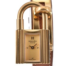 con carta orologio HERMES