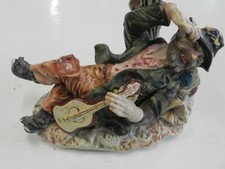 VINTAGE - statuetta in ceramica raffigurante un violinista sdraiato - ANTICHITA'