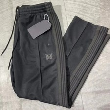 Pantaloni da pista con aghi ricamati di qualità pantaloni classici a righe