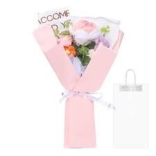 Bouquet di fiori all'uncinetto fatto a mano in maglia rosa sfumato in polvere