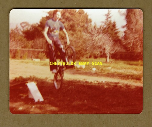 Richard jumping his bmx - his,
