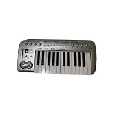 Behringer UMX25 Silver USB MIDI Audio 25-Key Ultra Compact Keyboard Controller