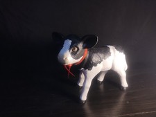 Standing Figurine of Cow Calf