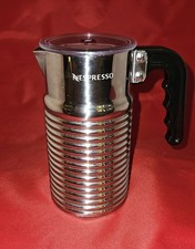 Brocca e coperchio montalatte