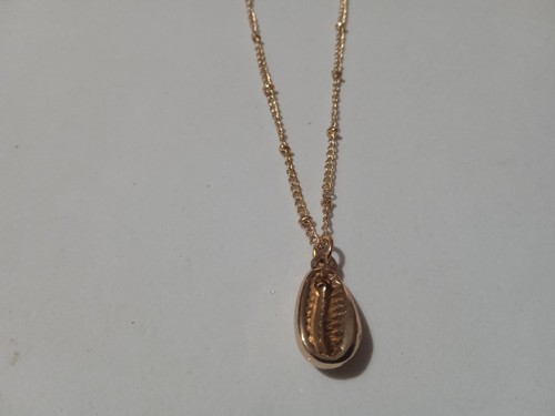 Collana lunga colore oro con