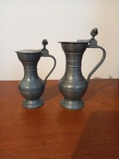 COPPIA DI PICCOLE BROCCHE IN PELTRO