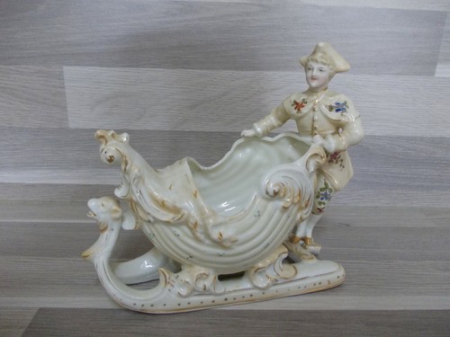 Antica scultura porcellana