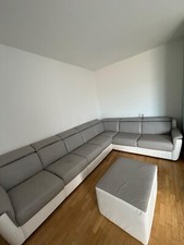 divano letto ad angolo in pelle vera usato grigio e bianco in ottime condizioni 