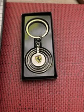 Portachiavi per auto d'epoca marchiato Ferrari in metallo colore argento