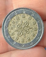rara moneta da 2 euro portogallo 2002, errore di conio.