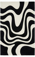 Tappeto nero e avorio