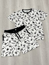 Set T-shirt e pantaloncino Moschino nuoto abbinato bianco nero stampa logo 