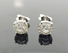 Orecchini in oro bianco 18 CT 750 e zirconi diametro 7 mm.