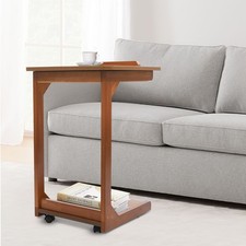 Tavolino a forma di C divano