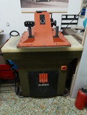TRANCIA modello SL 999/5 idraulica  per tessuti, cuoio e carta 