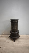 89804 Antica stufa in ferro a
