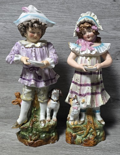 Coppia antiche statuine
