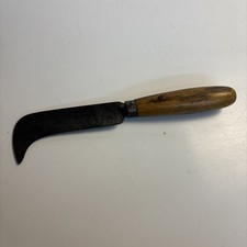 Antico coltello a gancio curvo