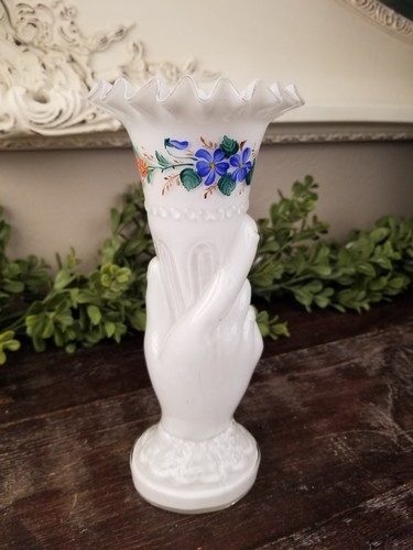 Antico vaso fiori torcia