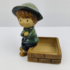 UCTCI Boy Figurine Sitting on
