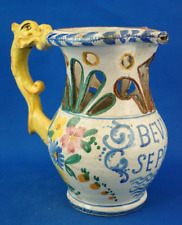 Fuschini & Rosa Acquapendente Brocca BEVI SE PUOI ceramica maiolicata traforata