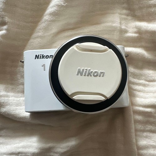 Nikon - , j1