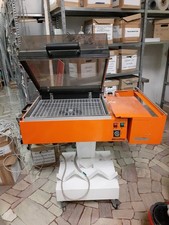 MACCHINA CONFEZIONATRICE CELLOFANATRICE TERMORETRAIBILE - INTERDIBIPACK MINI BIG