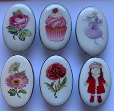 Bambole a croce d'argento