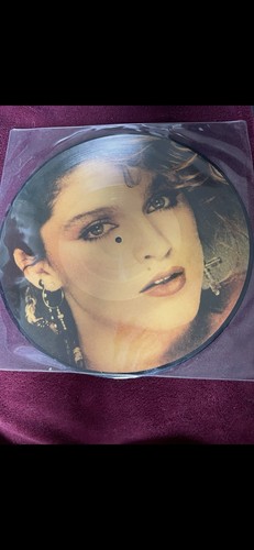 Madonna god she - -,