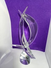 Coppia delfini stilizzati in