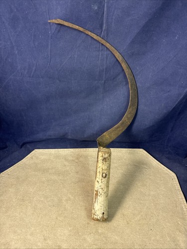 Antique rusty hand - rusty, sickle