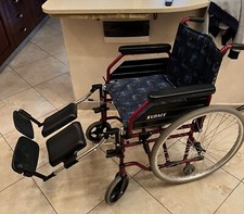 sedia a rotelle pieghevole