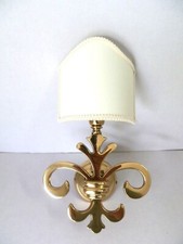 Applique in ottone lucido con