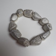 Bracciale con pietre dorate