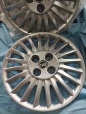 FIAT GRANDE PUNTO SET 4 COPRICERCHI COPPA RUOTA COPRIRUOTA BORCHIE 15" LOGO BLU