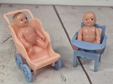 Passeggino neonato vintage Renewal rosa con bambino e vasino blu con bambino 