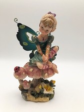 Fata fatina da collezione bionda con ali verdi statuina in resina stile fantasy