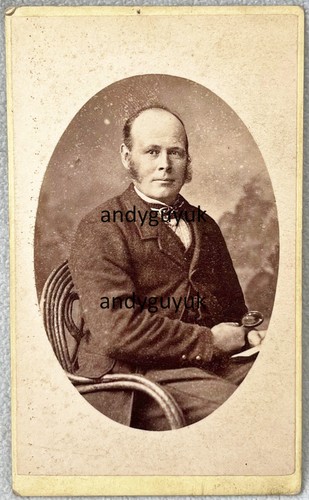 Cdv man holding - holding, magnifying