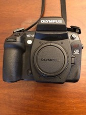 Olympus E 3 con power battery holder HLD-4