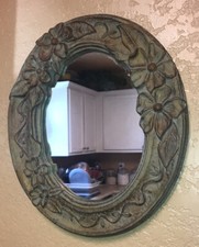 Specchio ovale in ceramica