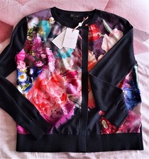 Cardigan nuovo con etichette