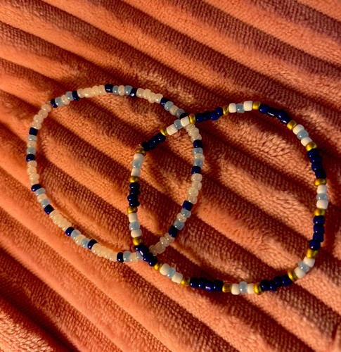 Coppia bracciali con - di,