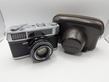 Minolta Hi-Matic 9 con Rokkor