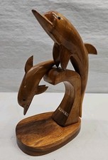 Scultura in legno intagliato a