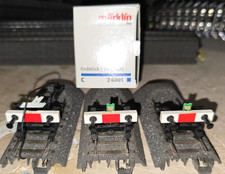 Lotto composto da 10 binari Märklin 24001 nuovi e 3 respingenti usati senza calo